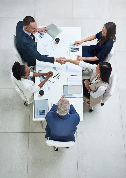 High angle shot of businesspeople having a meeting in a modern office.