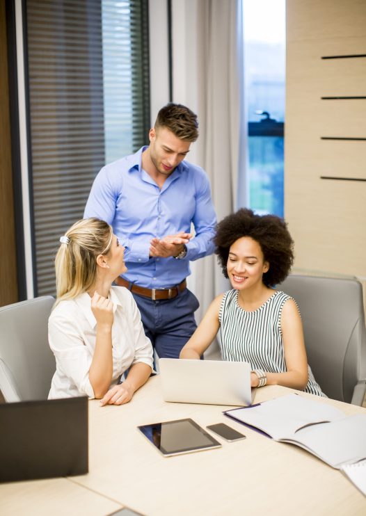 Group of young multiracial people working in the modern office